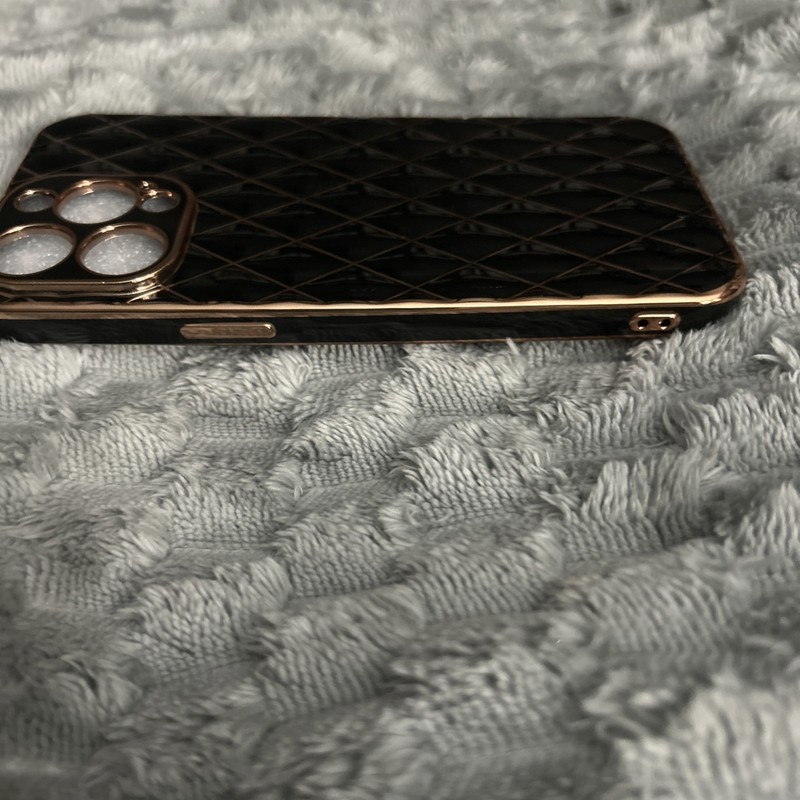 iPhone 14 Pro Max. Black with Gold Trim and Design. gallery