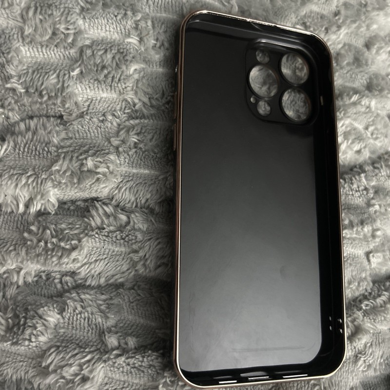 iPhone 14 Pro Max. Black with Gold Trim and Design. gallery