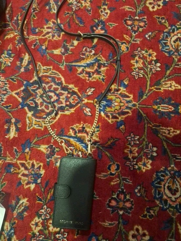 Michael Kors Solid Saffiano Leather Folio CaseWITH STRAP for I BELIEVE IPHONE X?